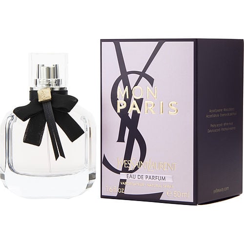 Close-up of the Mon Paris bottle showcasing its luxurious design and intricate detailing.