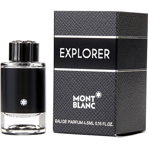 Flat lay of Montblanc Explorer Eau de Parfum with bottle and box arranged on textured surface, evoking sophistication and travel