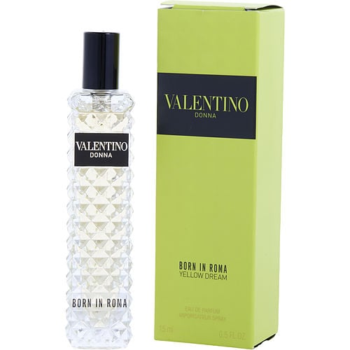 Close-up of Valentino Donna Yellow Dream perfume showing intricate glass texture and black label.